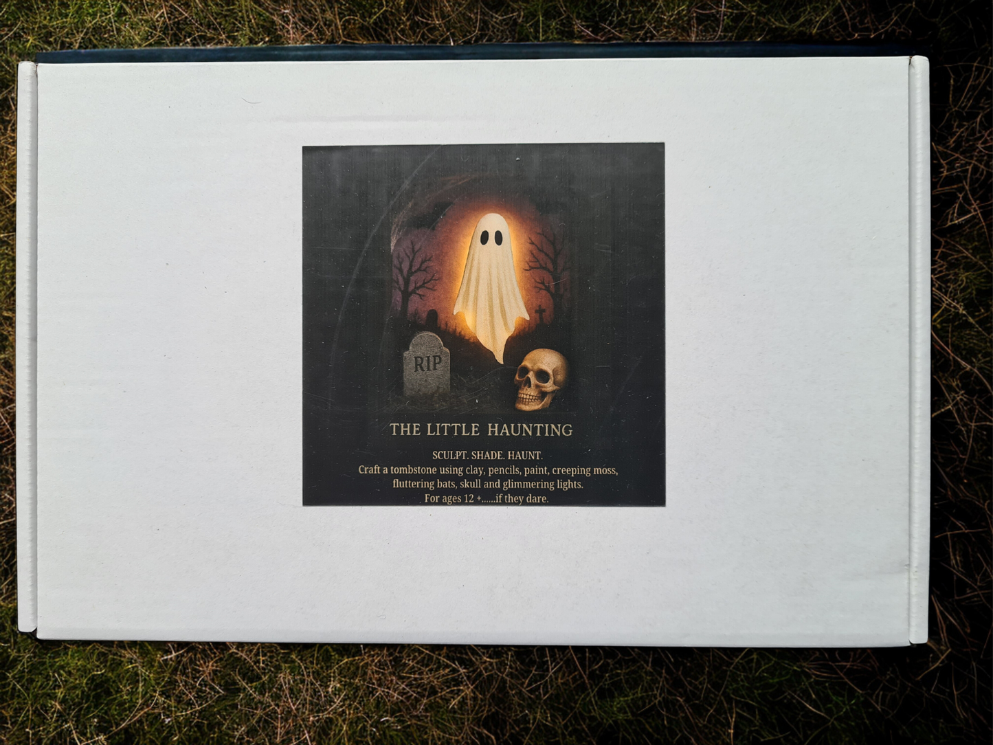 Box packaging for “The Little Haunting” 3D mixed media art kit, featuring gothic branding, product contents, and atmospheric design elements.