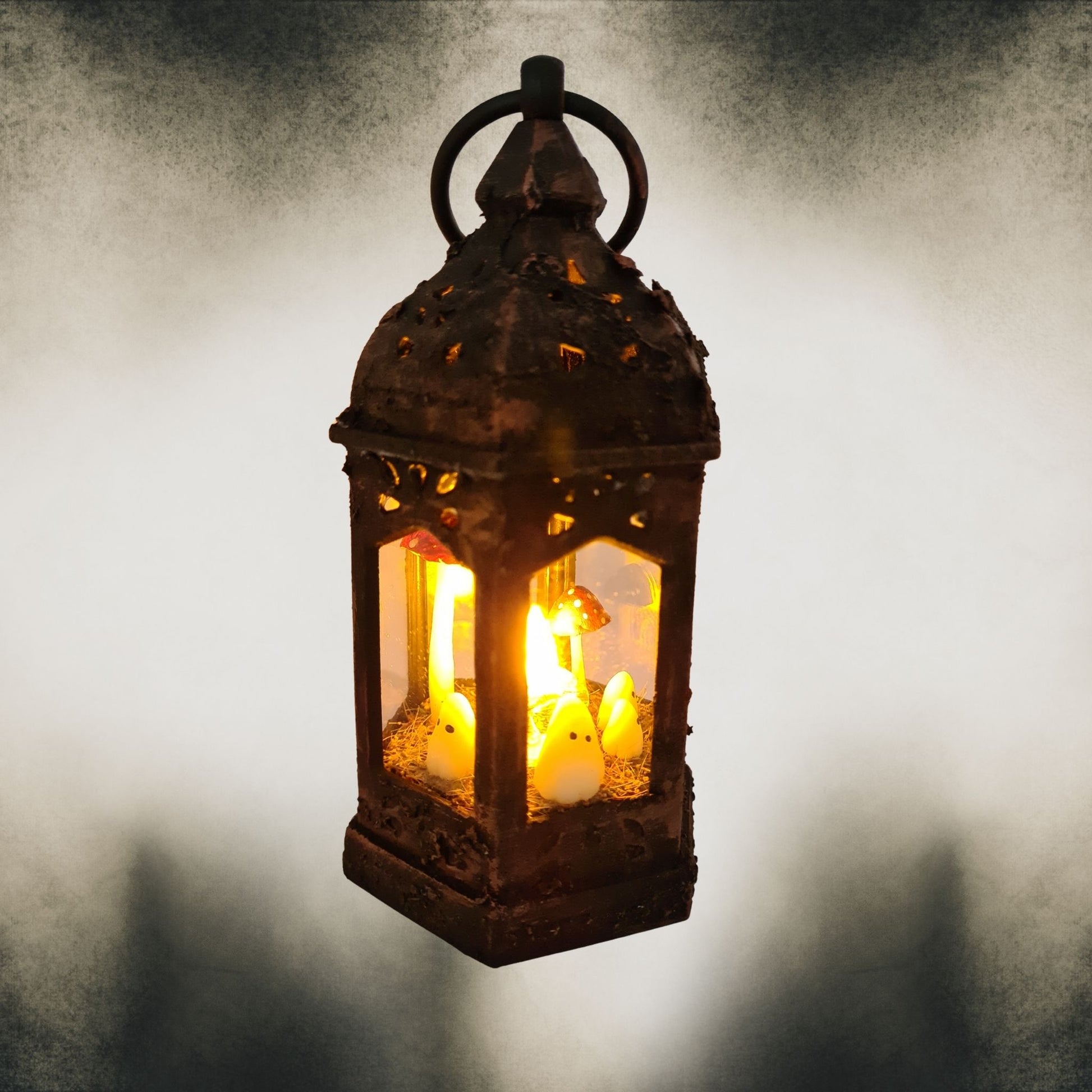Bronze dry-brushed handmade ghost lantern glowing with red mushrooms – spooky Halloween décor.