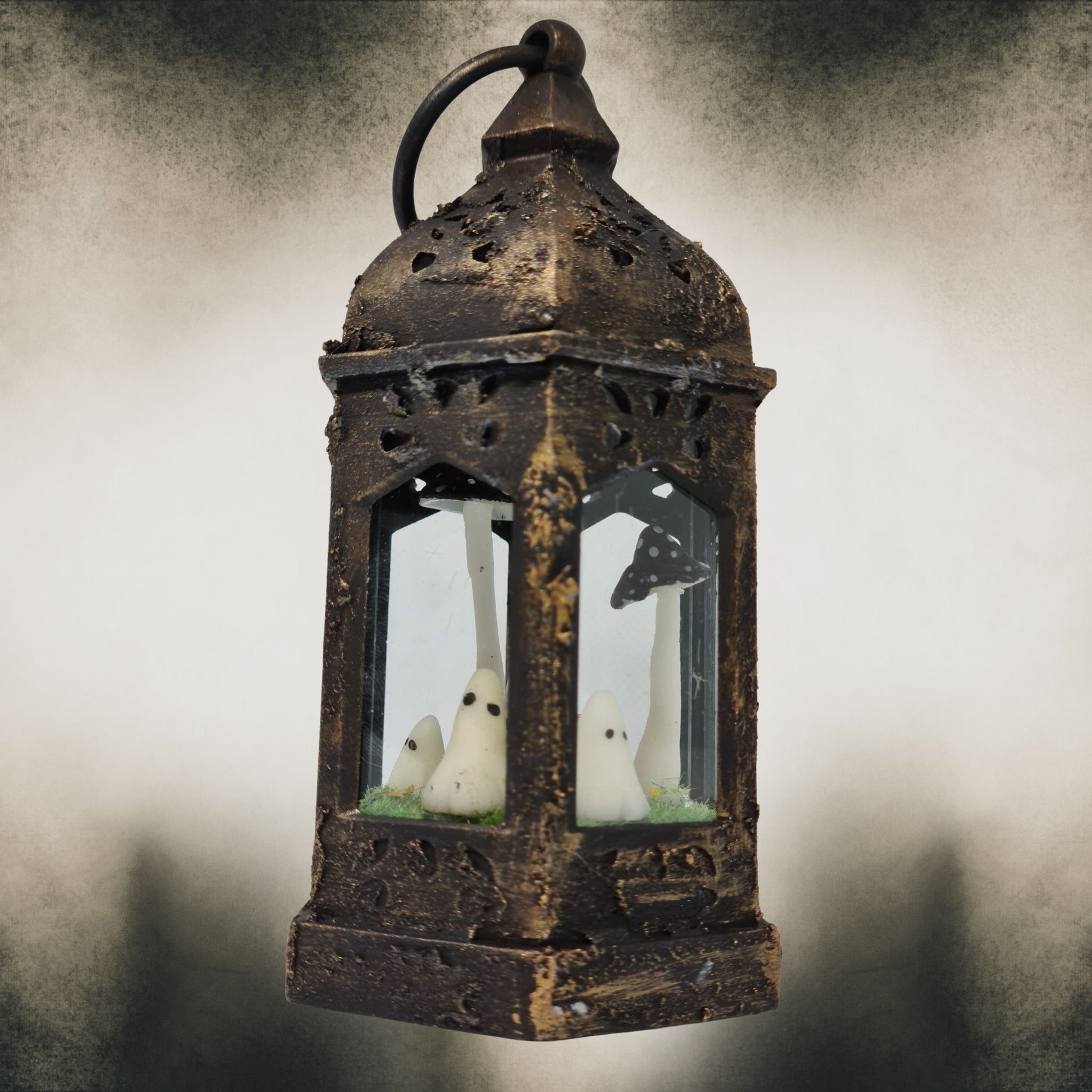 Gold handmade ghost lantern with black mushrooms – spooky Halloween gothic home decoration.