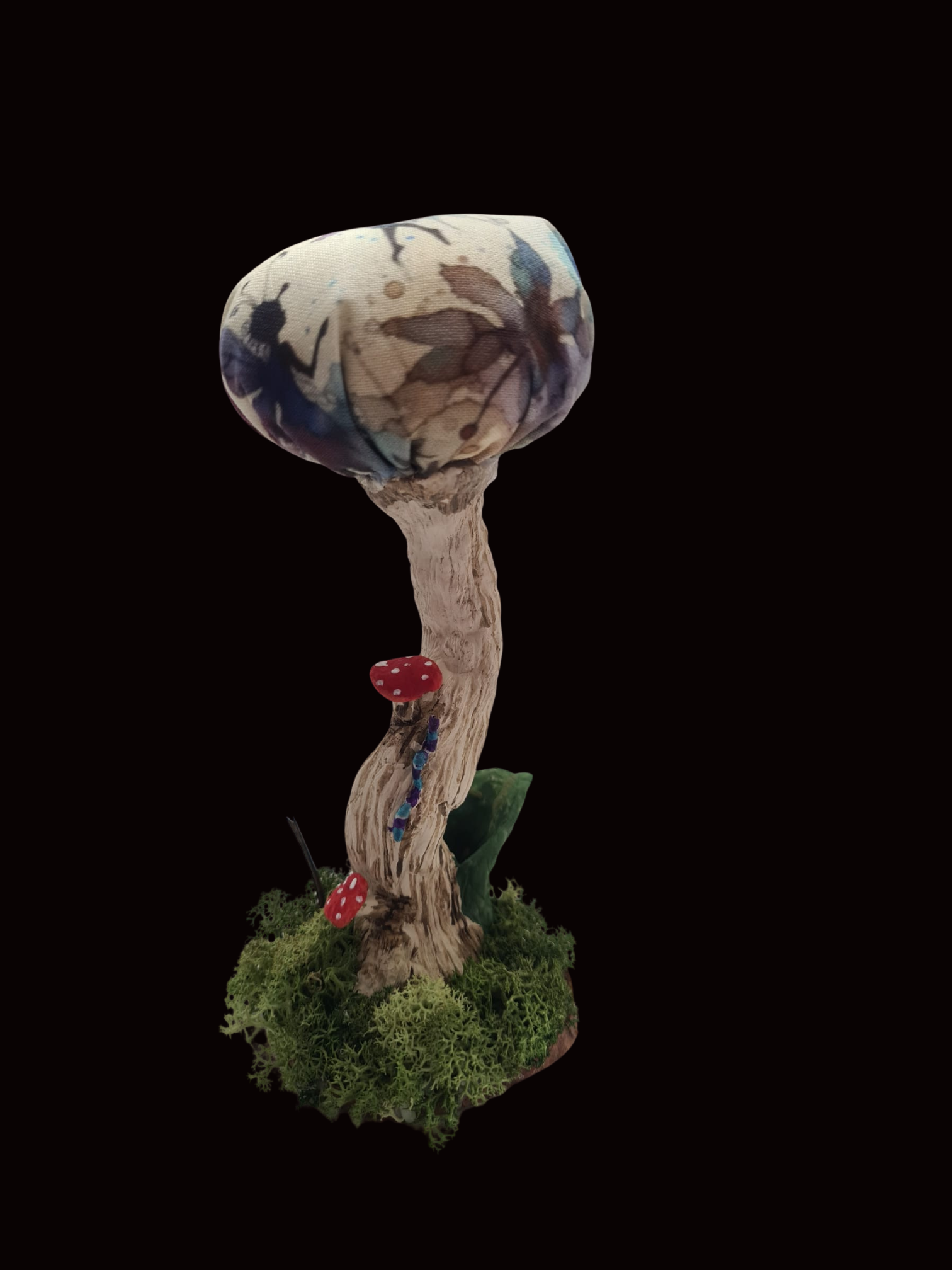 Handmade shroom pin cushion in Fairy Friends fabric without scissors.